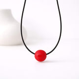 red chunky bead necklace lifestyle image, handmade jewellery at Lottie Of London