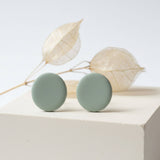 sage green stud earrings lifestyle handmade clay jewellery at Lottie of london