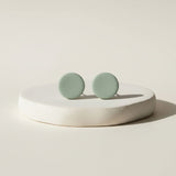 sage green clay stud earrings lifestyle handmade jewellery at Lottie of london