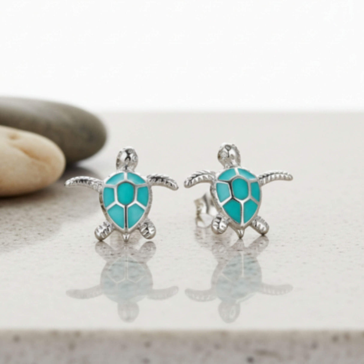 Blue Turtle stud earrings on stone plinth - Lottie of London jewellery