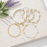 white daisy stacking bracelets at lottie of london uk