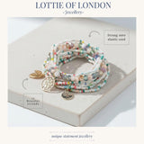 white and pastel bracelet stack infographics at Lottie of London