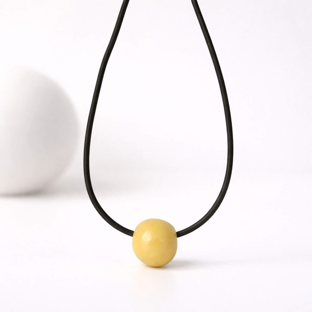 Yellow statement bead necklace lifestyle image, handmade jewellery at Lottie Of London
