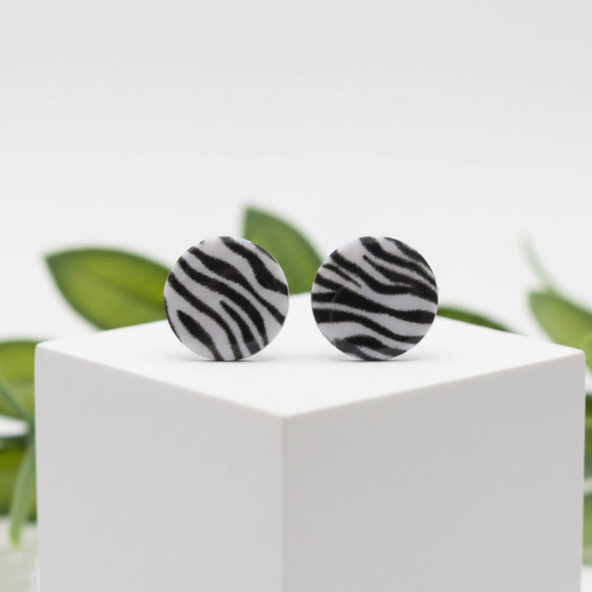 zebra print stud earrings, handmade clay jewellery at Lottie of London, lifestyle image