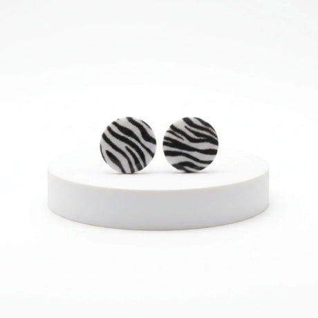 animal print stud earrings, handmade clay jewellery at Lottie of London, lifestyle image