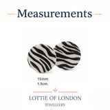 A measurement graphic for Lottie of London zebra-print stud earrings, showing two round studs with a black and white zebra pattern. The text indicates a size of 15mm 